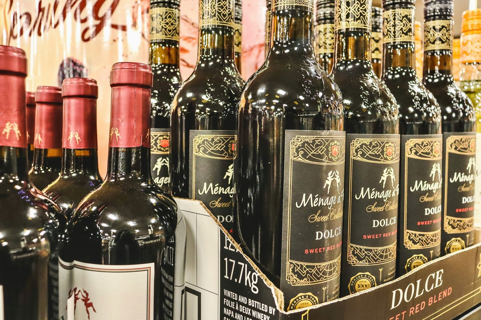 many bottles of wine are on display in a store